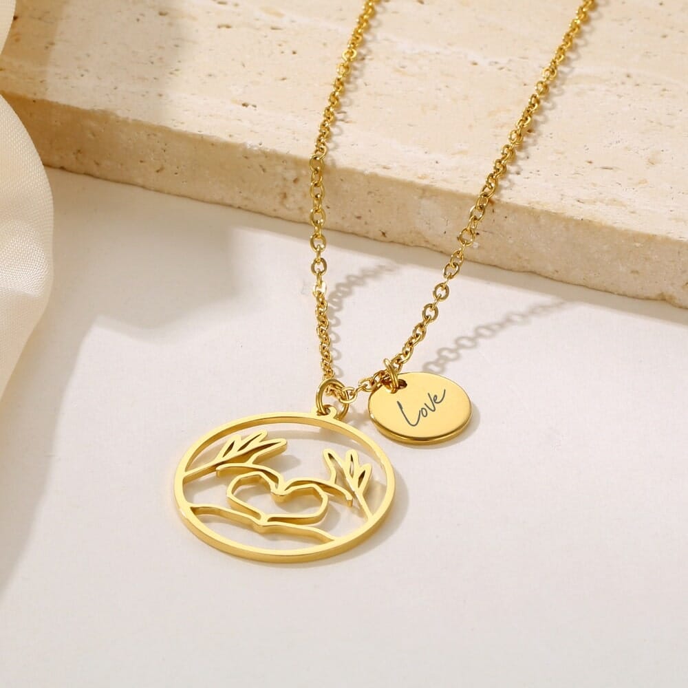 collana con pendente personalizzabile in acciaio e placcatura oro 18k